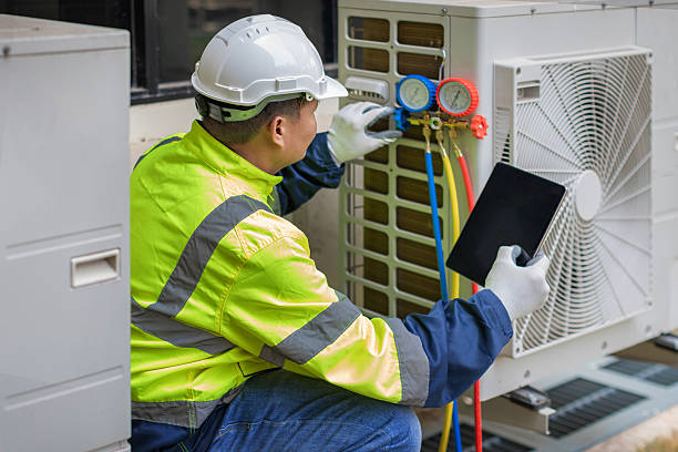 Professional Air Duct Cleaning technician working in Clarksville, AR